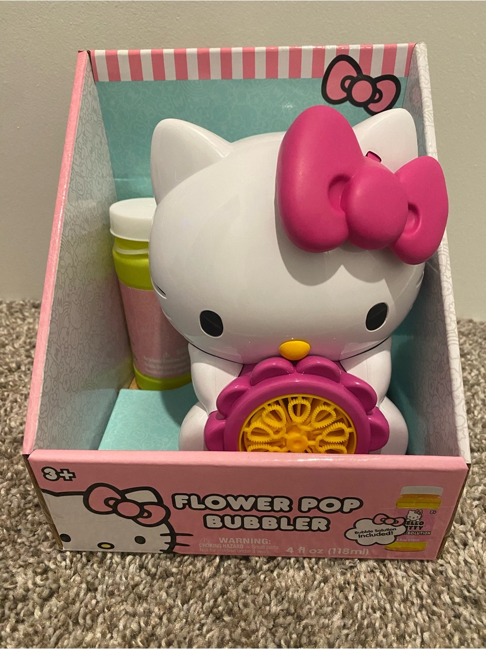 Brand new Hello Kitty Pink & White Flower Pop Bubble Toy game bubble machine